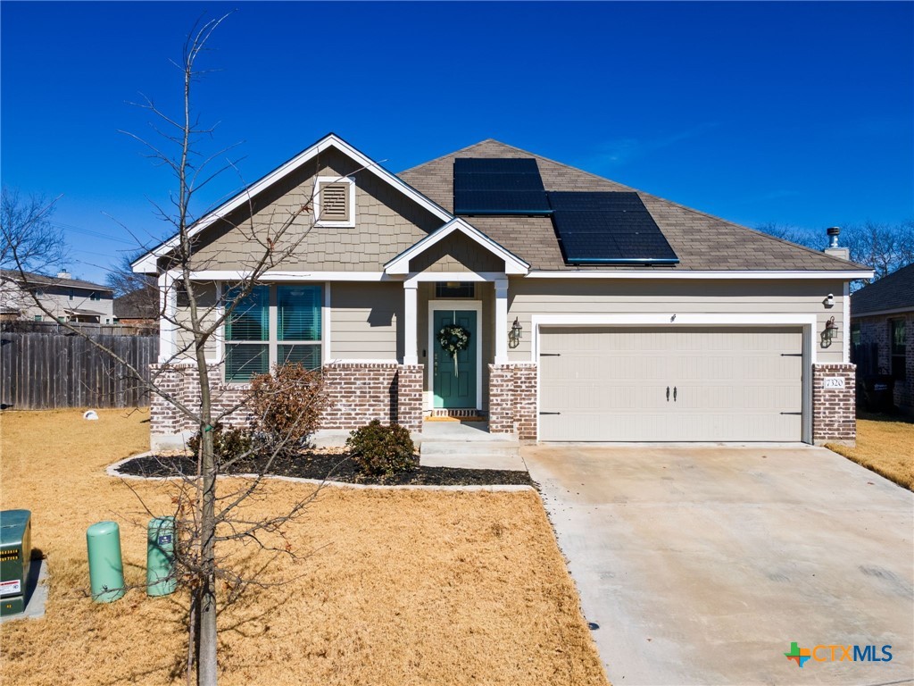 7320 Hammermill Lane Temple, TX 76502 - Photo 1 of 32 a front view of a house with a yard