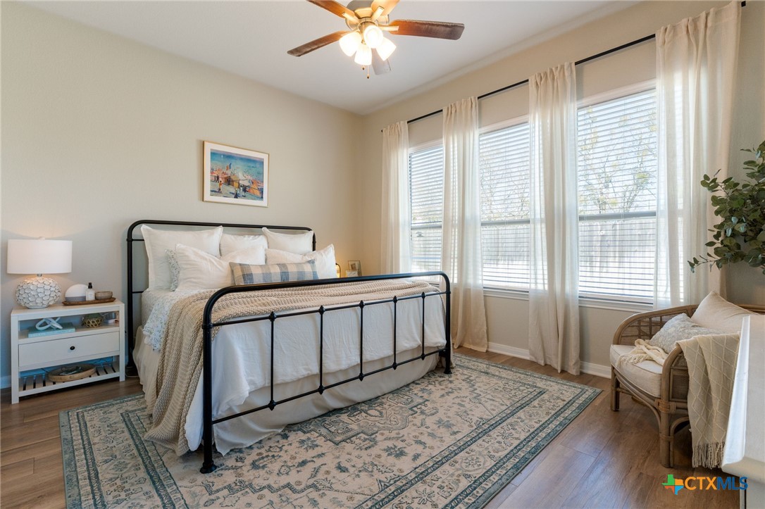 7320 Hammermill Lane Temple, TX 76502 - Photo 14 of 32 a bedroom with a bed and a window