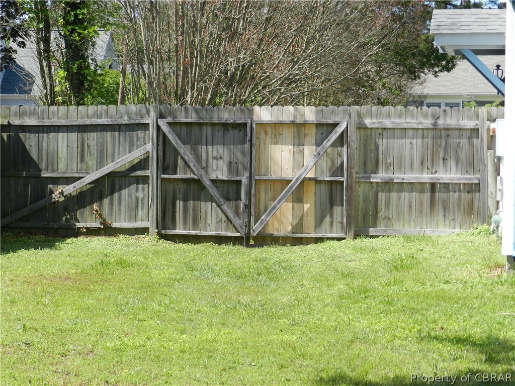 3330 Pine Grove Road Gloucester, VA 23061 - Photo 24 of 32 Backyard fence - double gate for access.