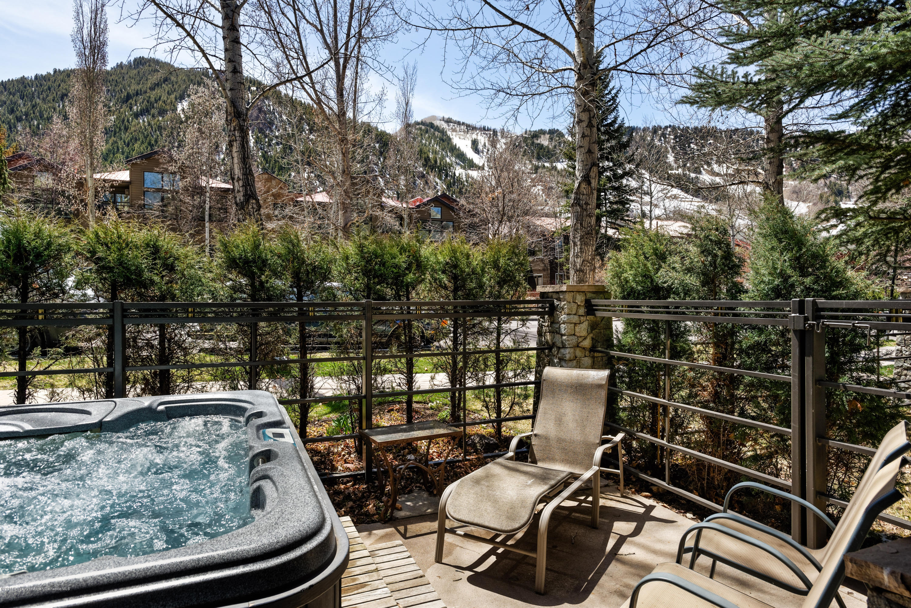 926 East Durant Avenue, Unit 3 Aspen, CO 81611 - Photo 17 of 20 a view of a chairs and tables in the balcony