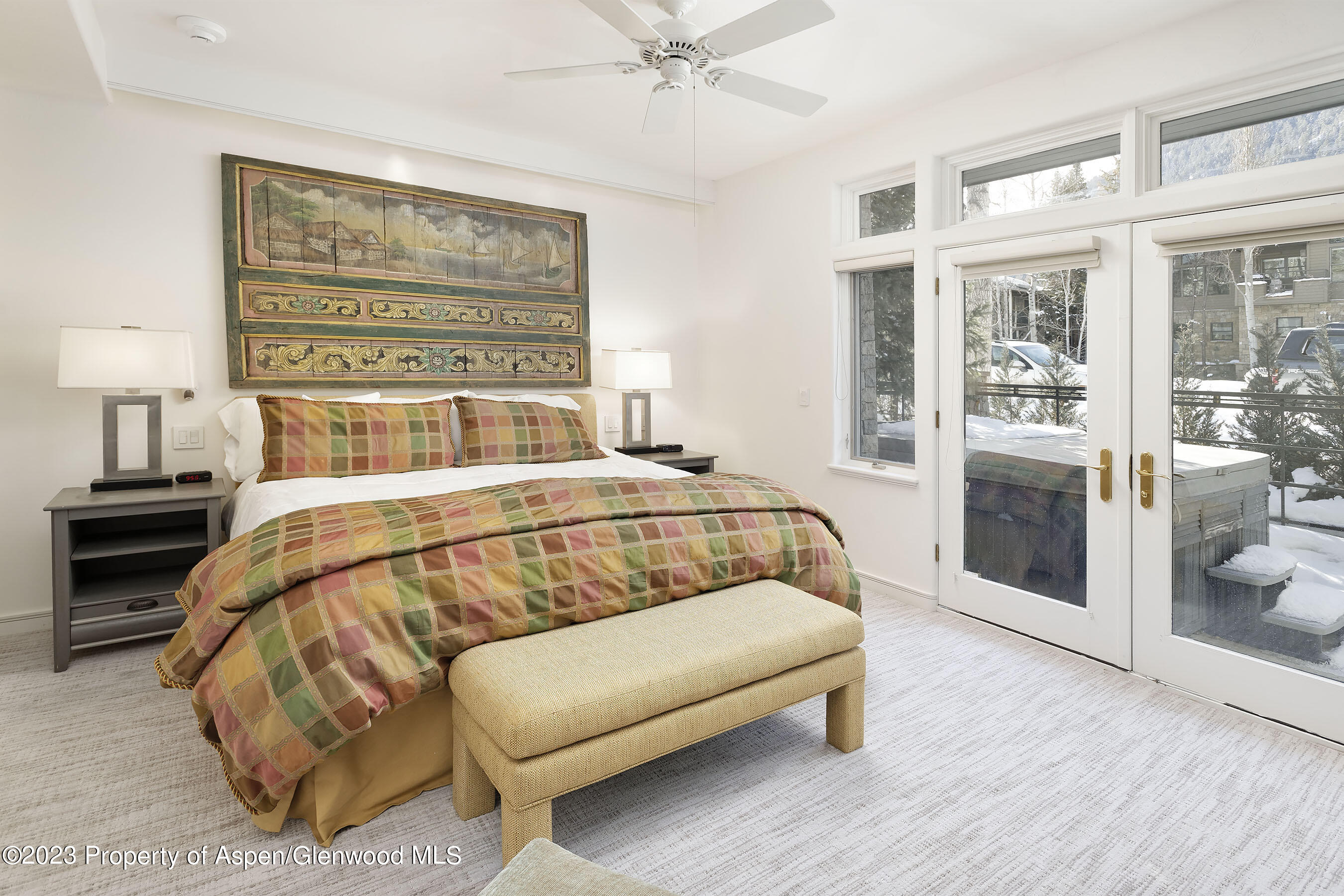 926 East Durant Avenue, Unit 3 Aspen, CO 81611 - Photo 8 of 20 a bedroom with a large bed and a window