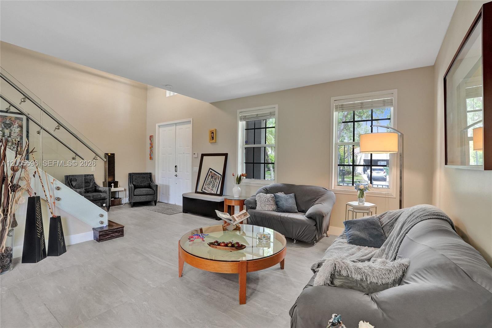 4281 Laurel Ridge Circle Weston, FL 33331 - Photo 17 of 80 a living room with furniture and a large window