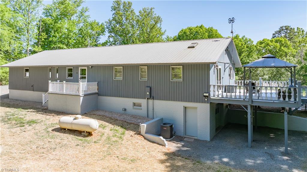 7362 Volunteer Rescue Road Denton, NC 27239 - Photo 35 of 50 Back of home with entrance to basement