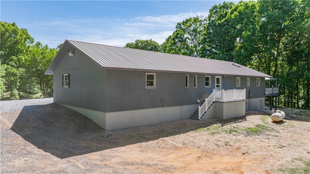7362 Volunteer Rescue Road Denton, NC 27239 - Photo 36 of 50 Back of home with entrance into dining area