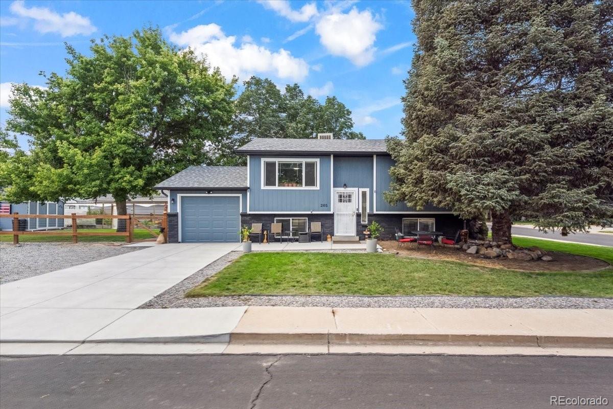 205 Walnut Street Frederick, CO 80530 - Photo 2 of 31 a house with a outdoor space