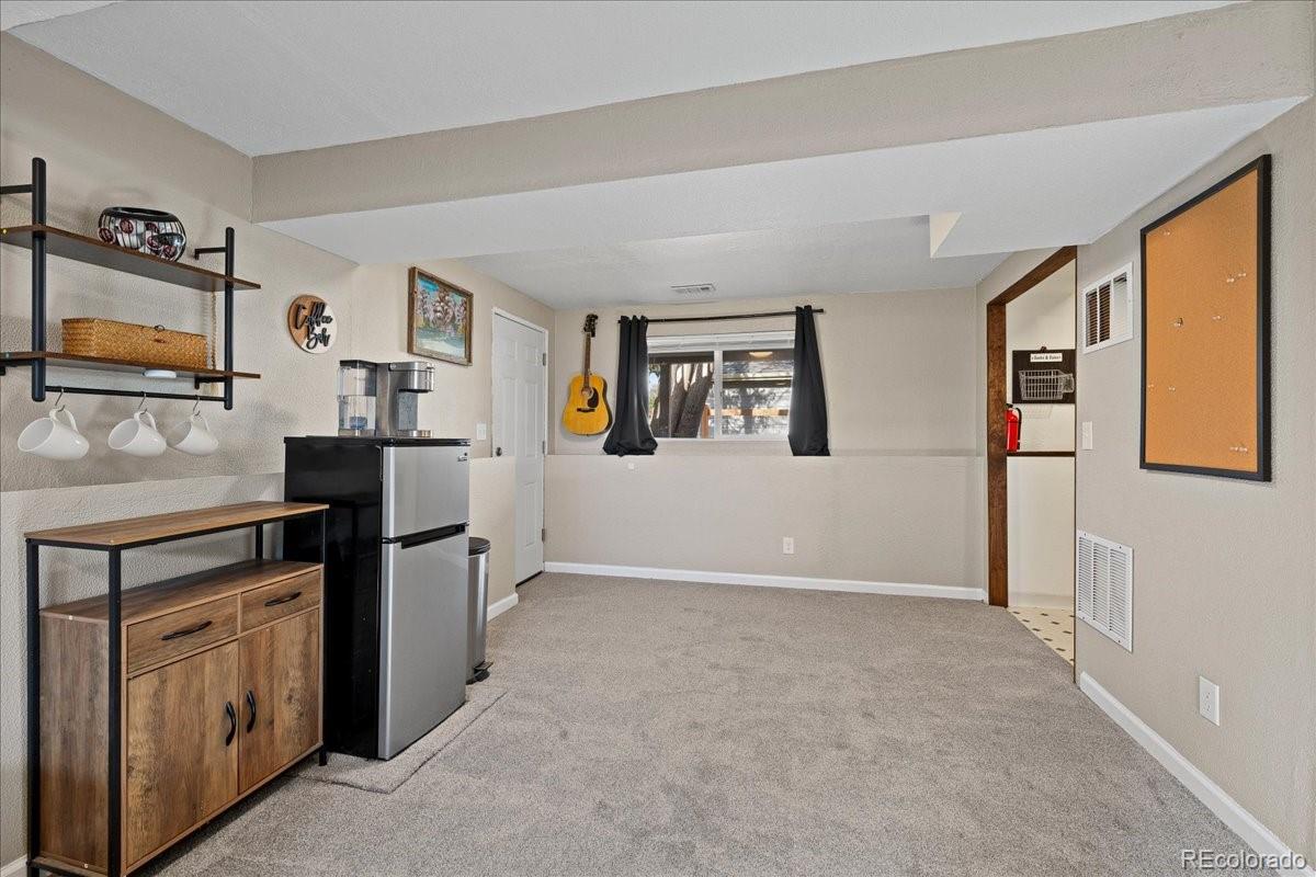 205 Walnut Street Frederick, CO 80530 - Photo 21 of 31 a view of a kitchen with electric appliances