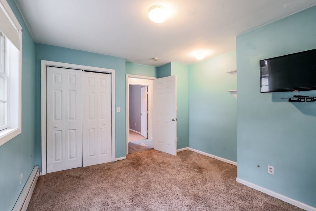 20 Flagg Street Boylston, MA 01505 - Photo 25 of 39 a view of a livingroom with a flat screen tv
