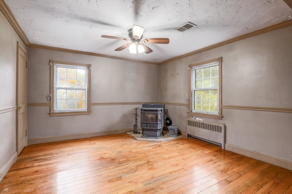 20 Flagg Street Boylston, MA 01505 - Photo 31 of 39 an empty room with windows and fan