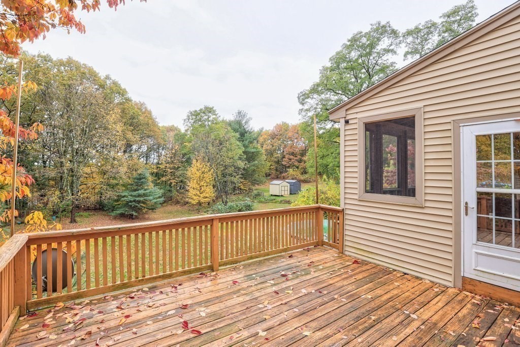 20 Flagg Street Boylston, MA 01505 - Photo 5 of 39 a view of a wooden deck with a yard