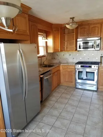 a car parked in front of a house