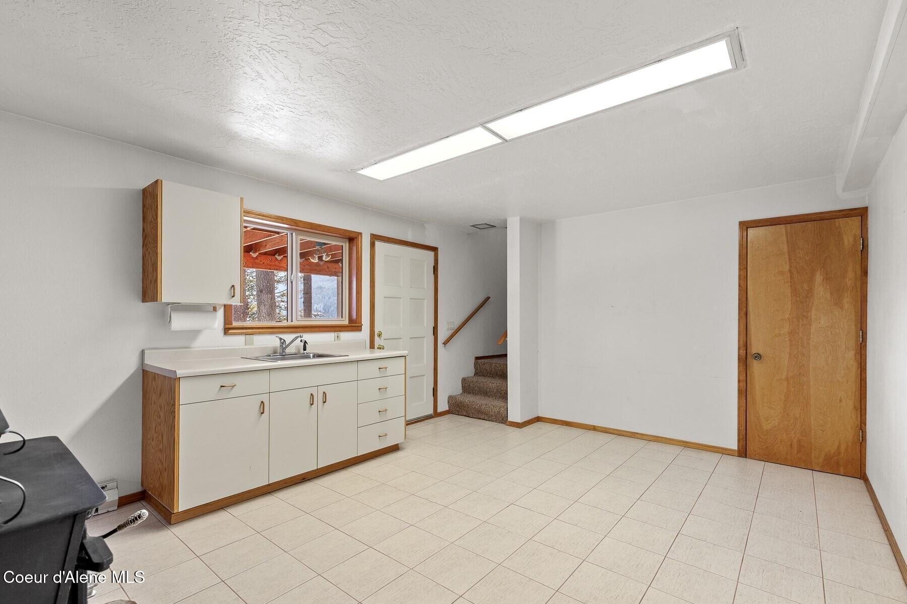 5977 East McMahon Road Hayden, ID 83835 - Photo 20 of 39 Basement Kitchenette