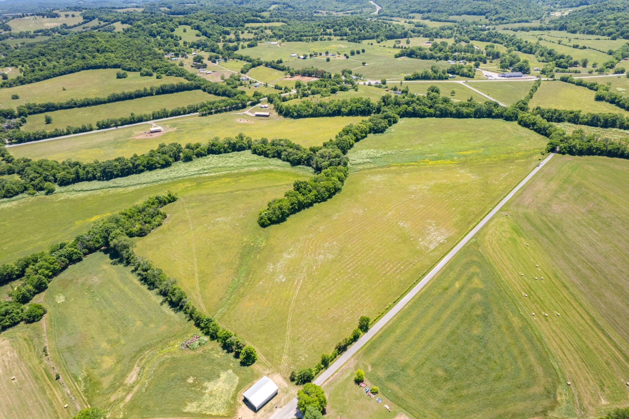 32 Hart Leonard Road Cornersville, TN 37047 - Photo 28 of 58 an aerial view of residential houses with outdoor space