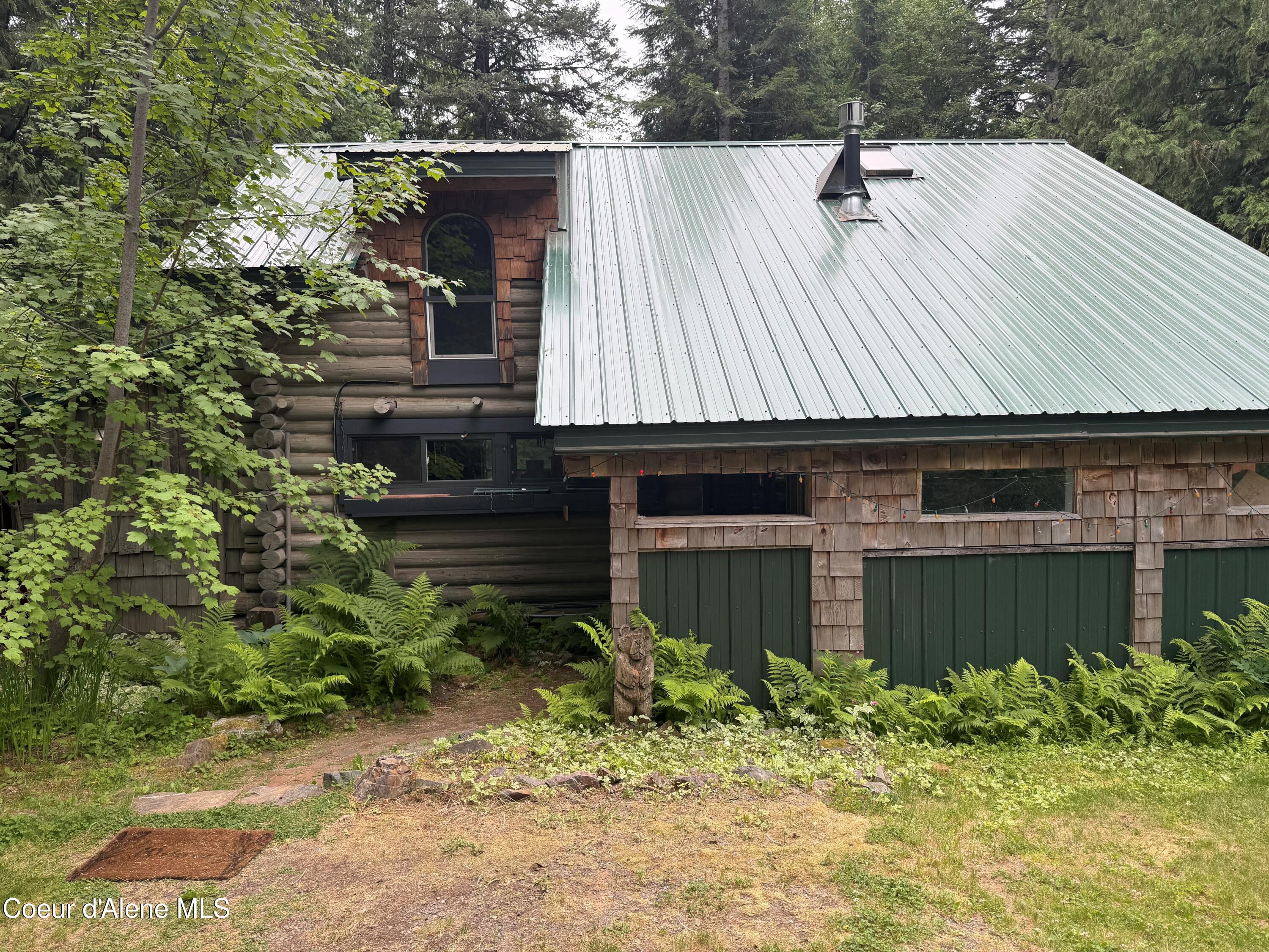 1283 North Wrenco Road Sandpoint, ID 83864 - Photo 1 of 1 Log home in idyllic setting