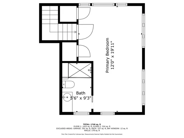 a picture of a room with a white wall and a large window