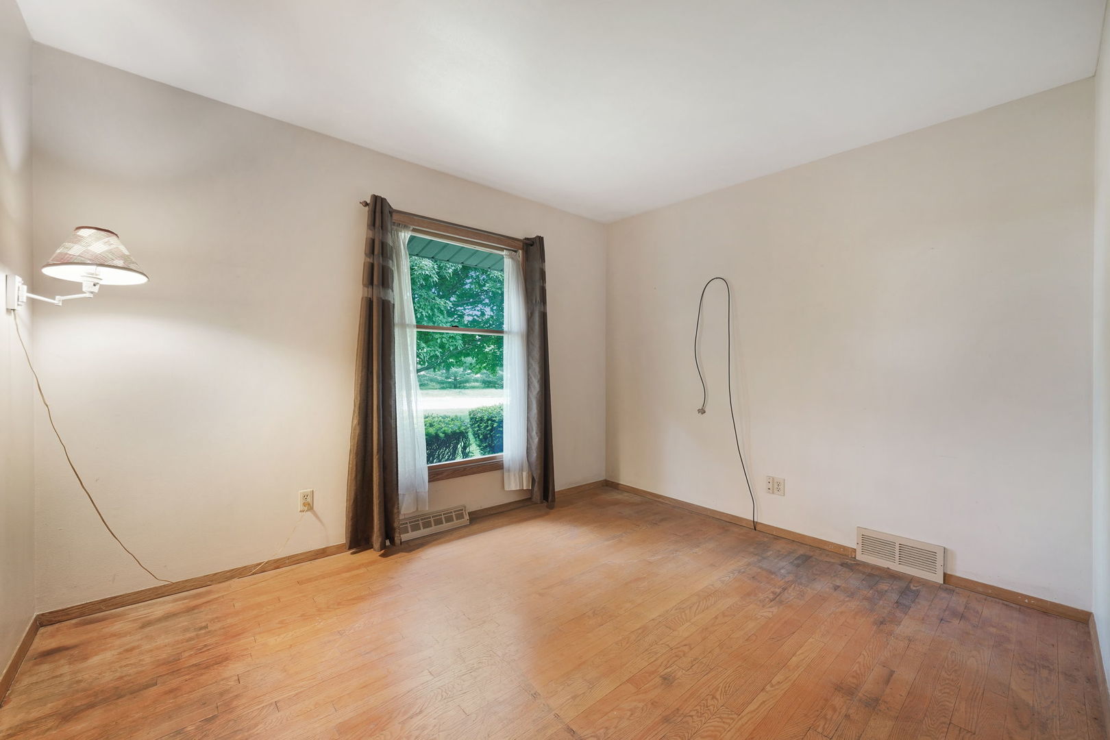 10626 North Grove Road Sycamore, IL 60178 - Photo 19 of 28 a view of an empty room with a window