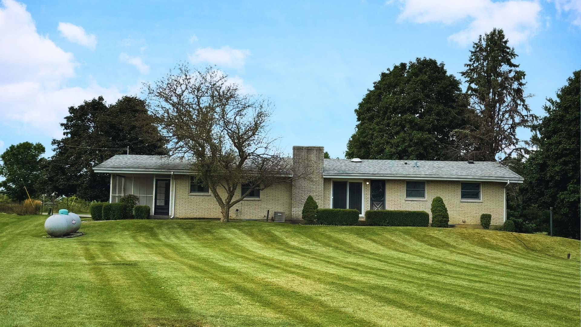 10626 North Grove Road Sycamore, IL 60178 - Photo 24 of 28 a front view of a house with a yard