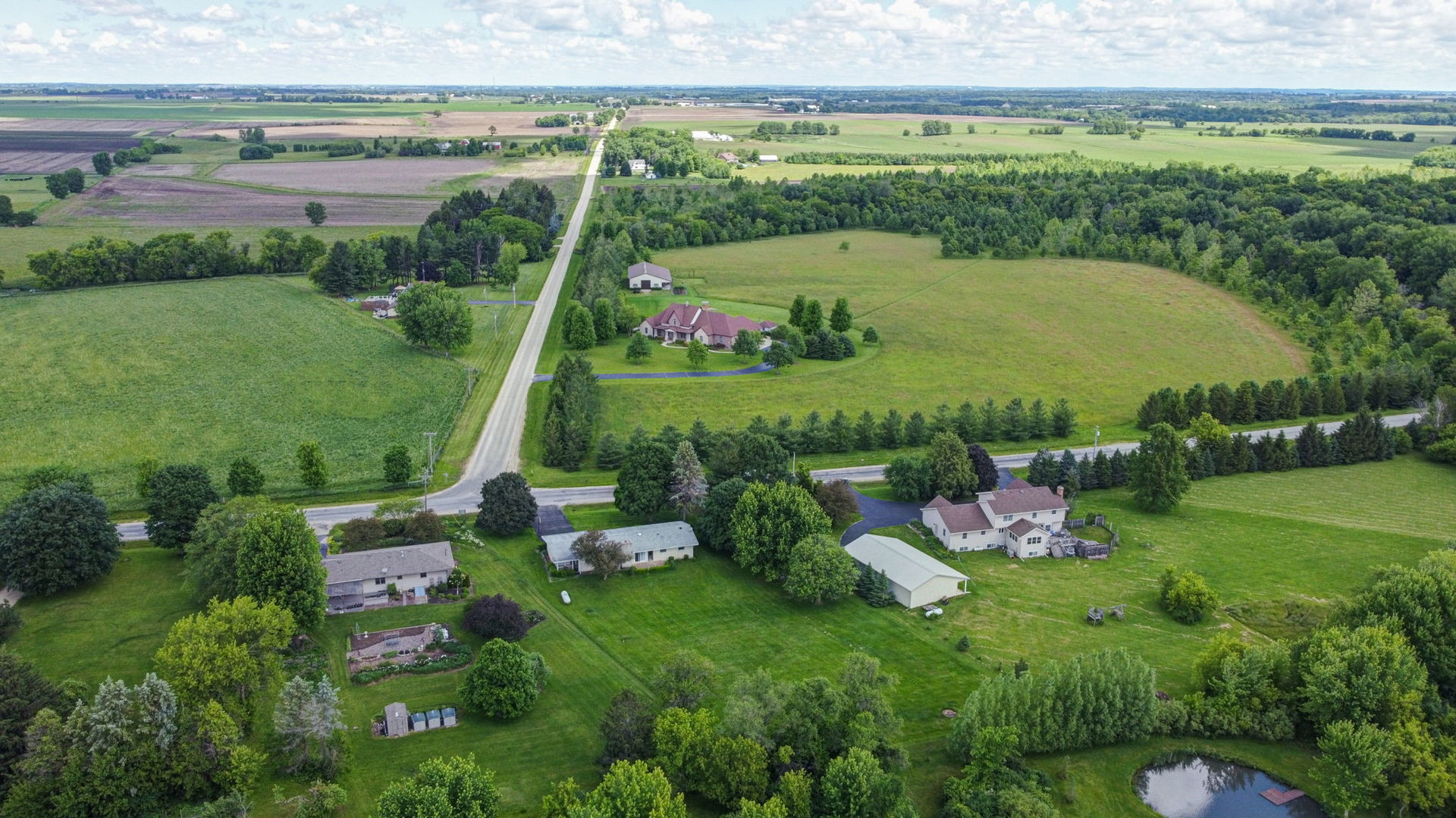 10626 North Grove Road Sycamore, IL 60178 - Photo 27 of 28 an aerial view of a house with a garden
