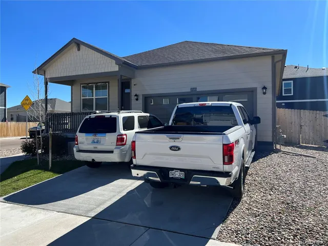 a car parked in front of a house