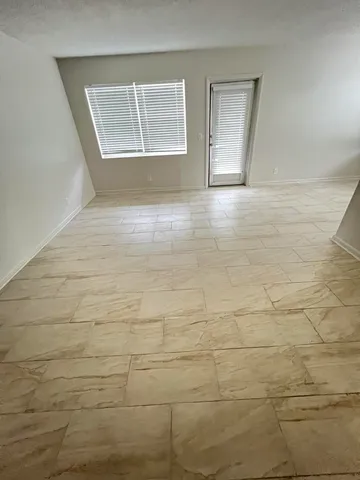 a bathroom with a sink vanity and mirror