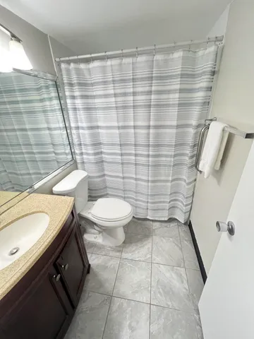 a view of a porch with a bench