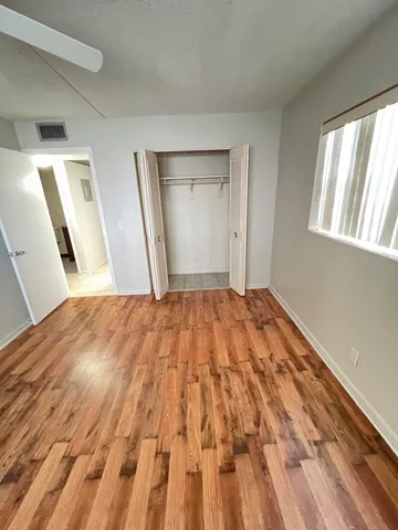 a view of a house with a yard and plants