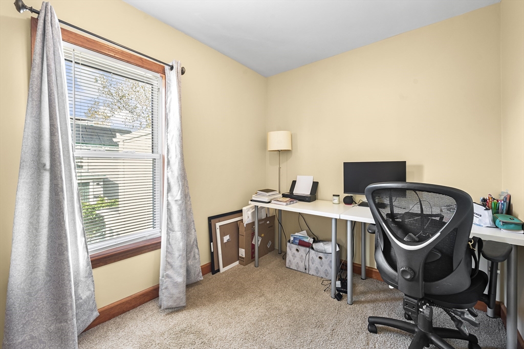 50 Temple Street, Unit 50 Somerville, MA 02145 - Photo 26 of 41 a view of a workspace with furniture and a window