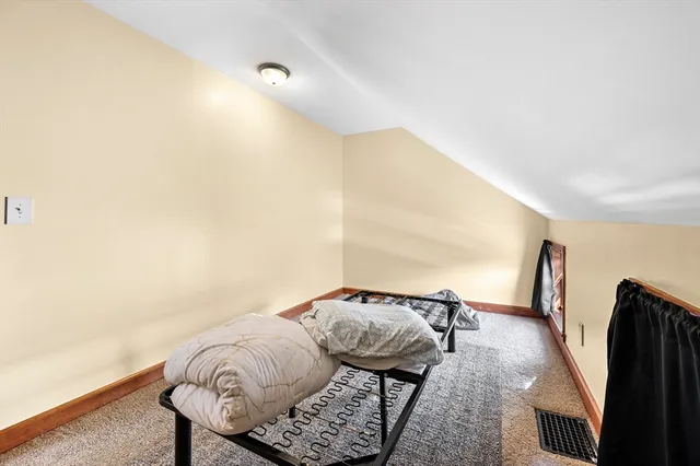 a living room with a table and a couch