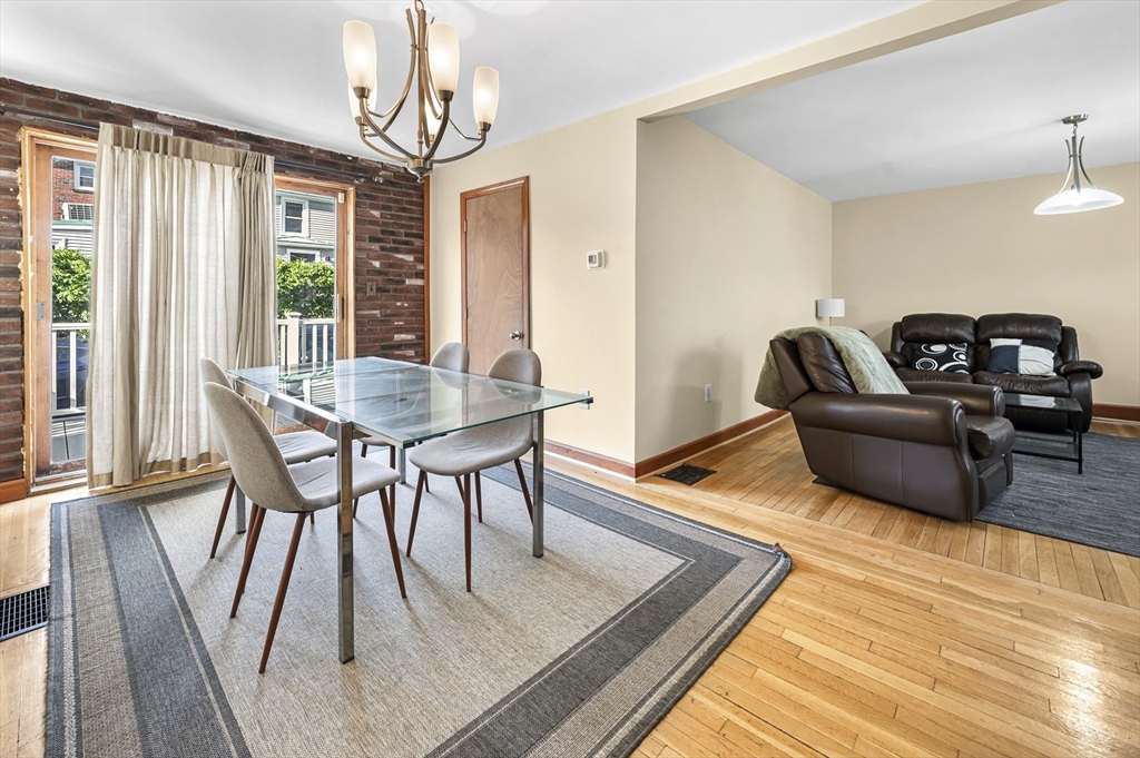 50 Temple Street, Unit 50 Somerville, MA 02145 - Photo 6 of 41 a living room with furniture and a table