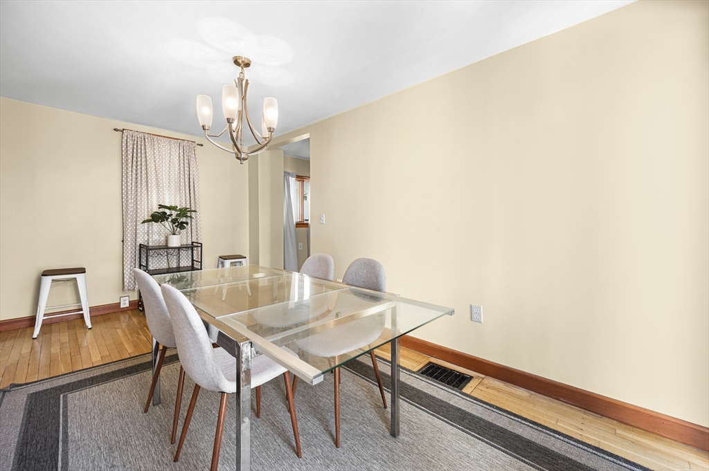 50 Temple Street, Unit 50 Somerville, MA 02145 - Photo 8 of 41 a view of a dining room with furniture