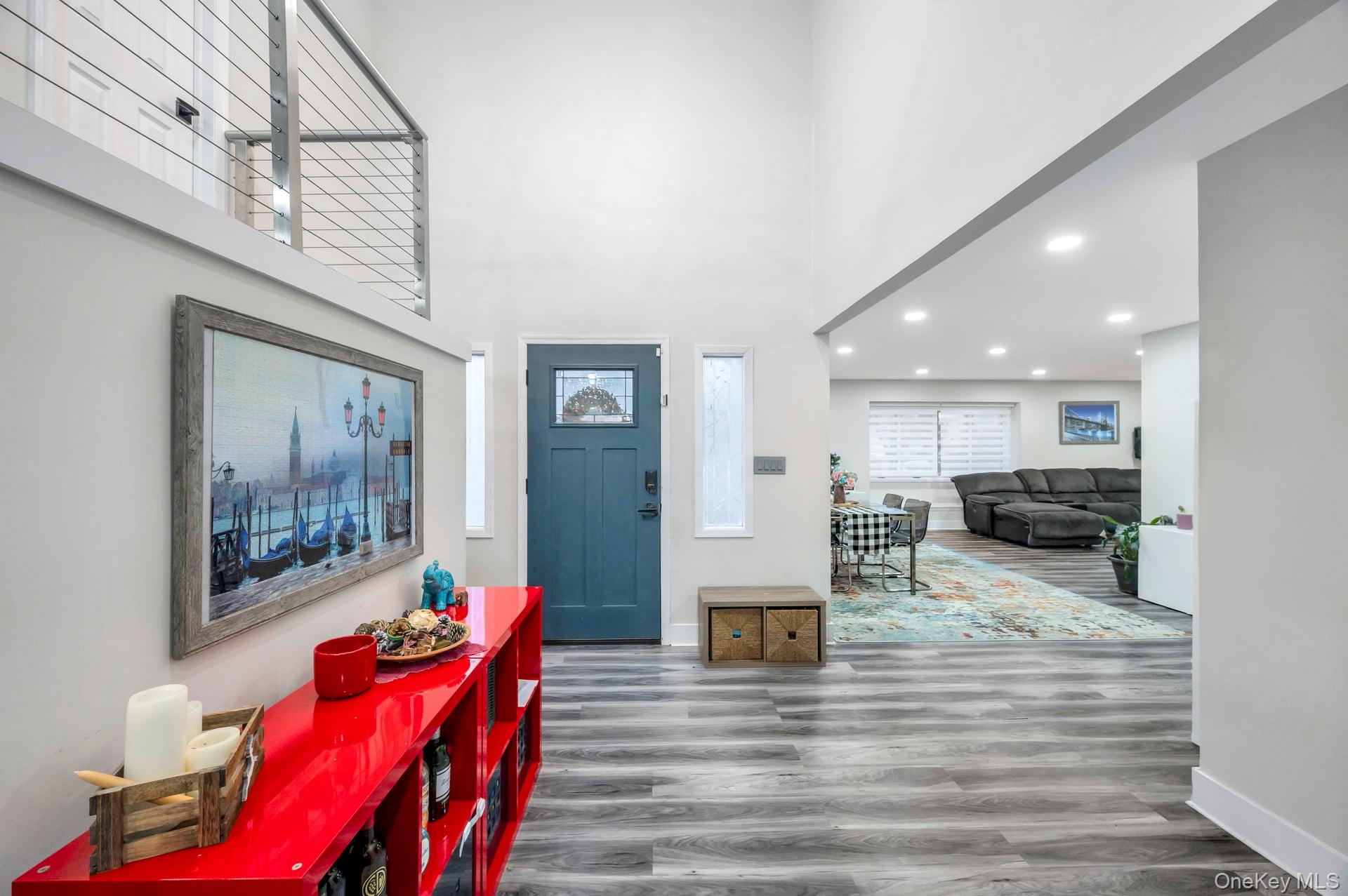 15 Drake Avenue Bellport, NY 11713 - Photo 3 of 20 a living room with furniture or couch and a wooden floor