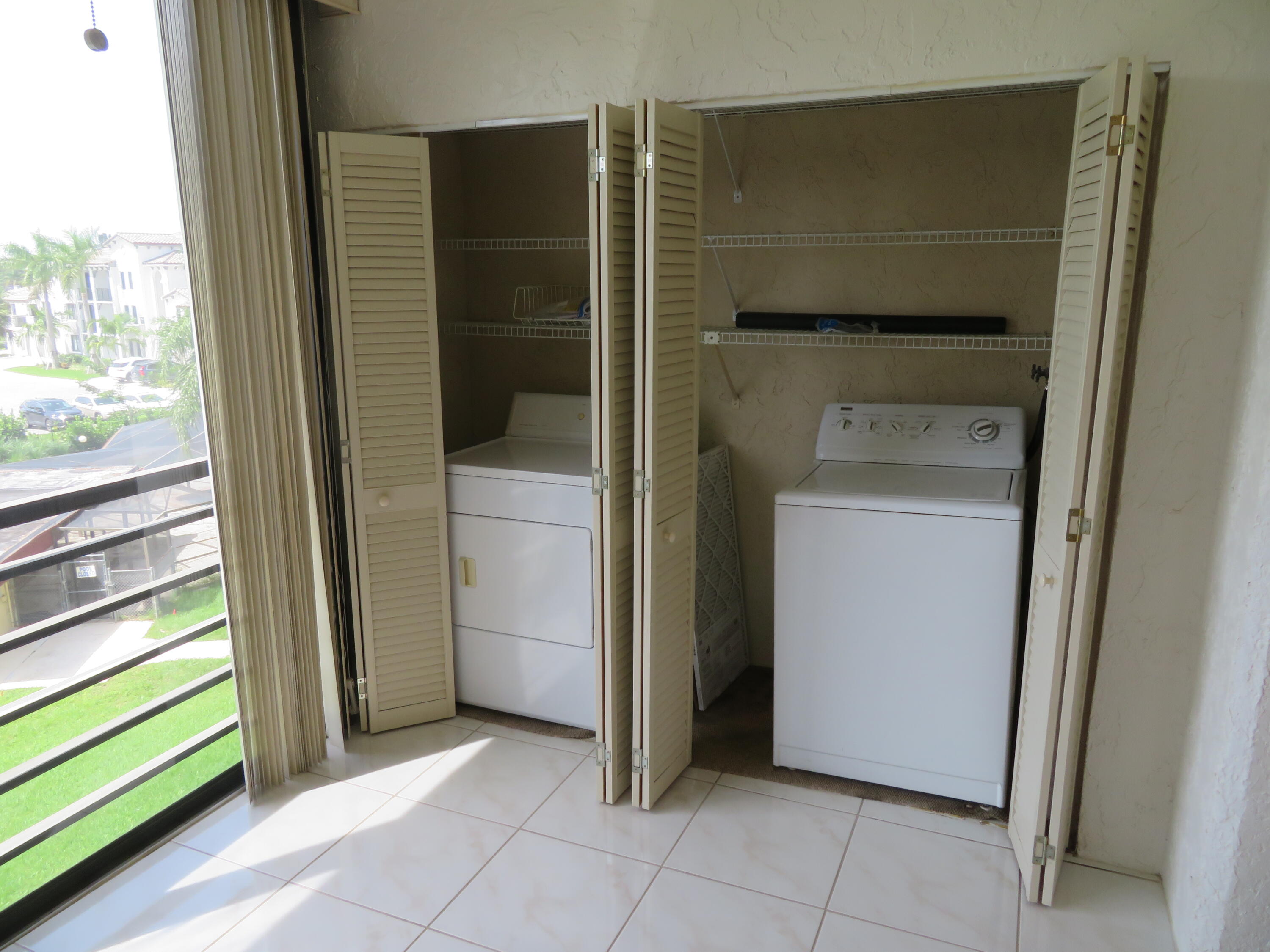 9233 Southwest 8th Street, Unit 409 Boca Raton, FL 33428 - Photo 29 of 40 42 9233-409 Laundry
