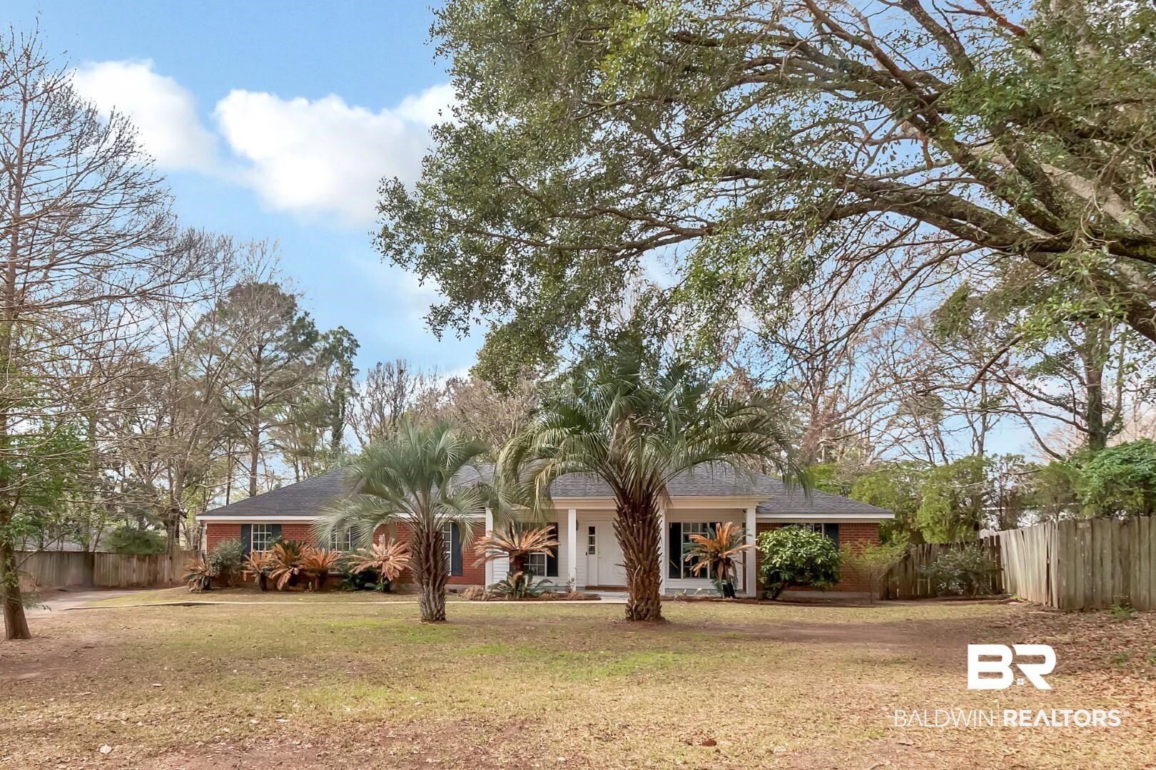 10006 Wedgefield Court Mobile, AL 36608 - Photo 12 of 34 Ranch-style home featuring a front yard, brick siding, and fence