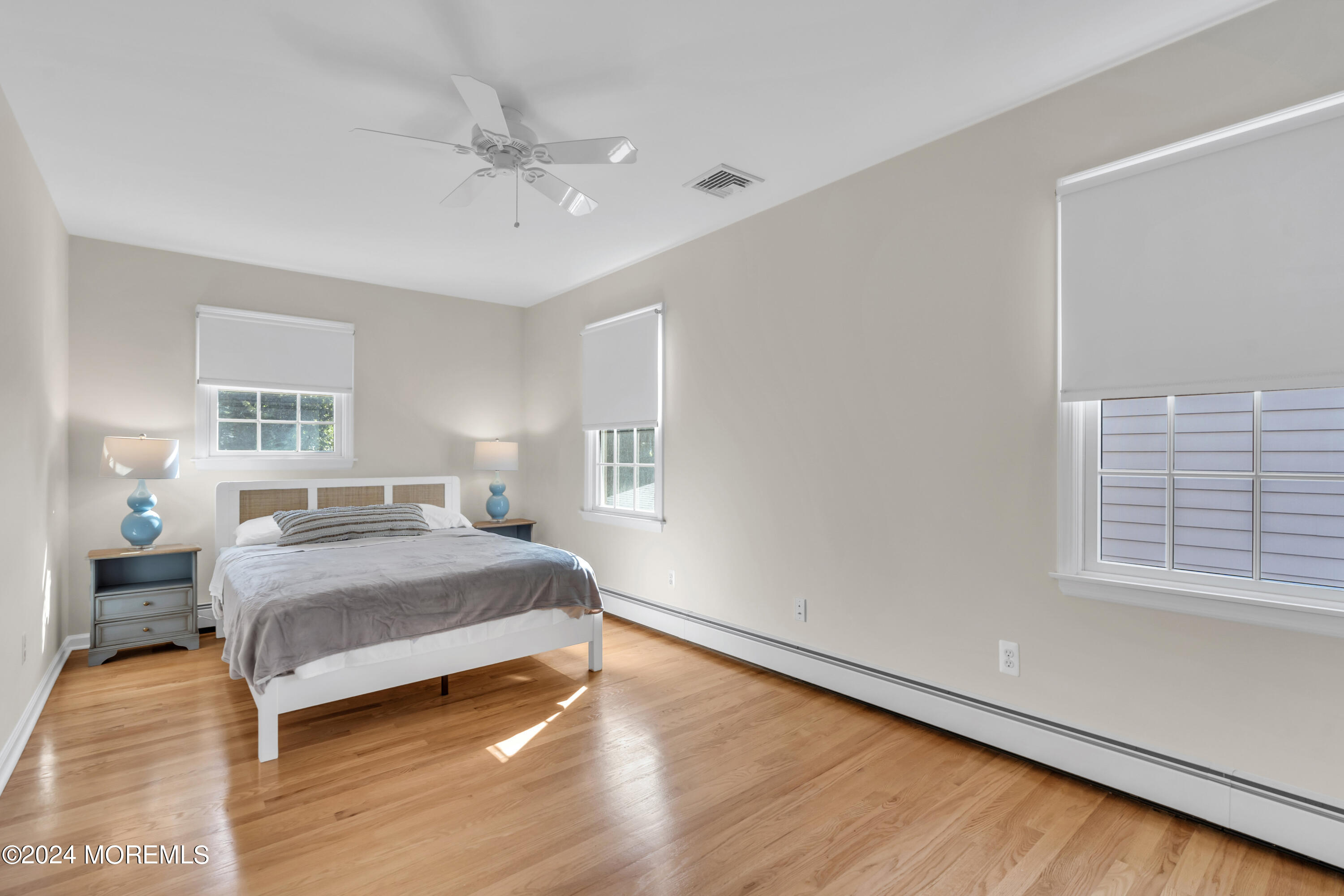 807 Prospect Avenue Spring Lake Heights, NJ 07762 - Photo 18 of 27 a bedroom with a bed and window