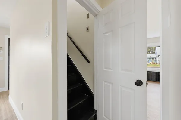 a view of a hallway with entryway