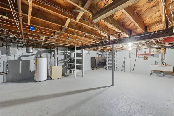 a view of a garage with wooden floors