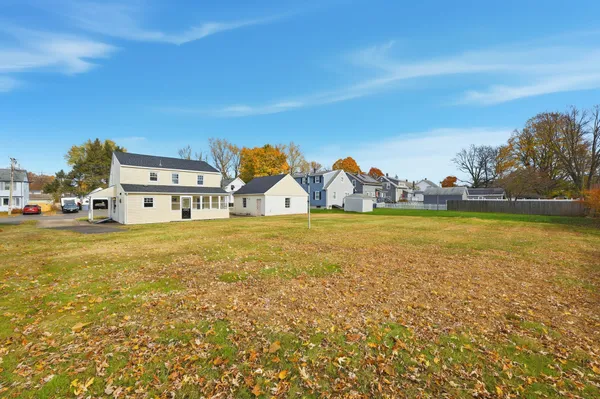 a view of a large body of water with a building in the background