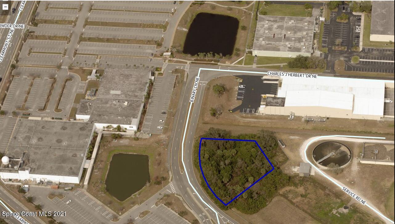 1151 Binary Lane Northeast Palm Bay, FL 32905 - Photo 3 of 5 a utility room with dryer and washer