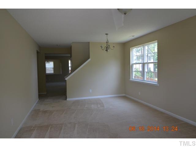 5841 Parkchester Road Raleigh, NC 27616 - Photo 2 of 8 a view of an empty room with a window