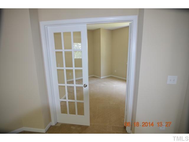 5841 Parkchester Road Raleigh, NC 27616 - Photo 3 of 8 a view of empty room with windows