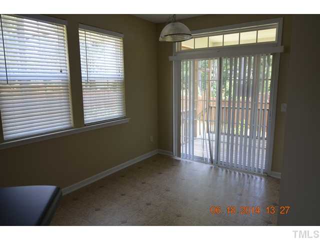 5841 Parkchester Road Raleigh, NC 27616 - Photo 5 of 8 a view of an empty room with a window