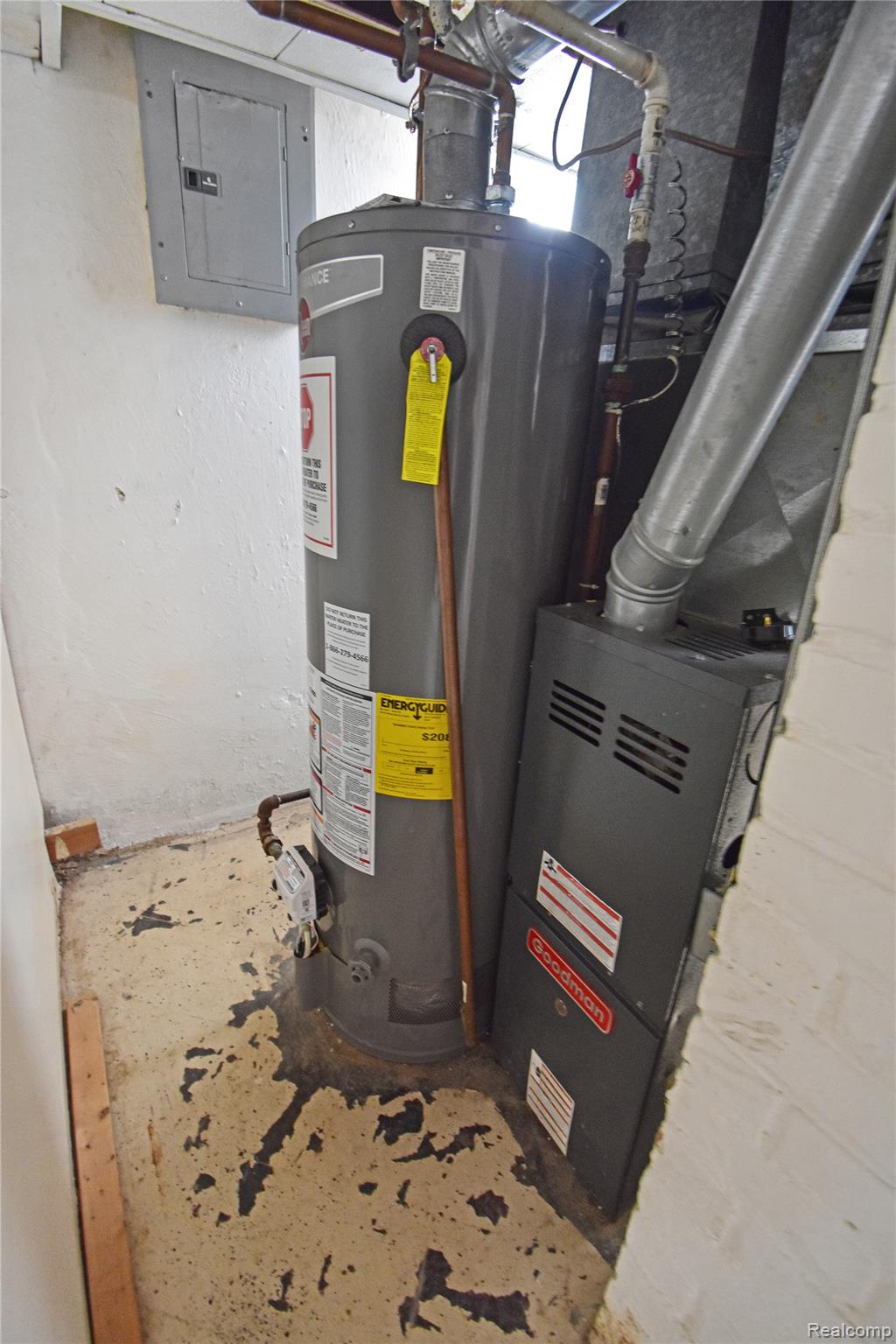 8305 Stephens Road Center Line, MI 48015 - Photo 21 of 23 Utilities featuring water heater and electric panel