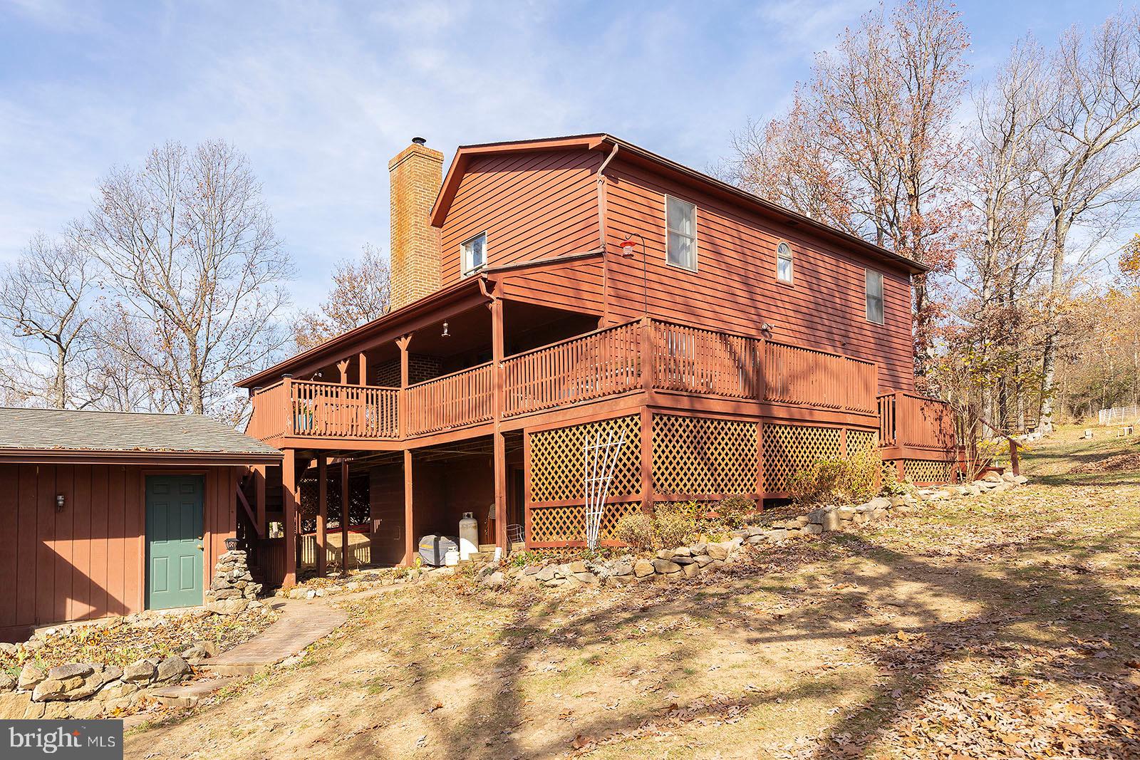 1100 Fishel Road Winchester, VA 22602 - Photo 28 of 74 The wide covered porch wraps on 3 sides