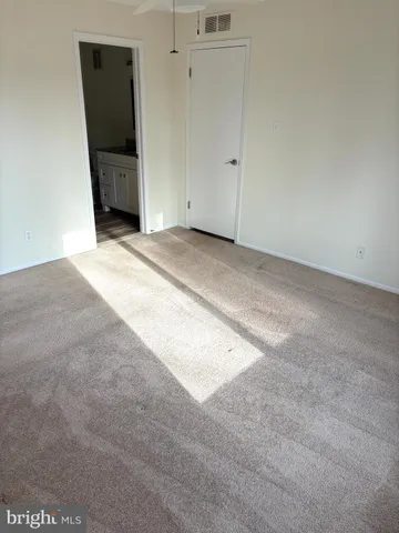 a view of a livingroom with wooden floor