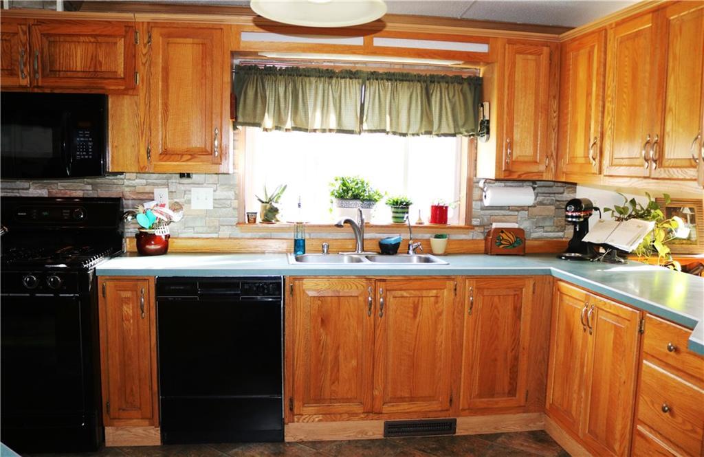 909 Mariaville Road Ellsworth, ME 04605 - Photo 2 of 30 Spacious kitchen with lots of...