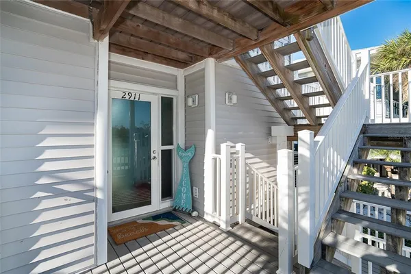 a view of an entryway with a front door