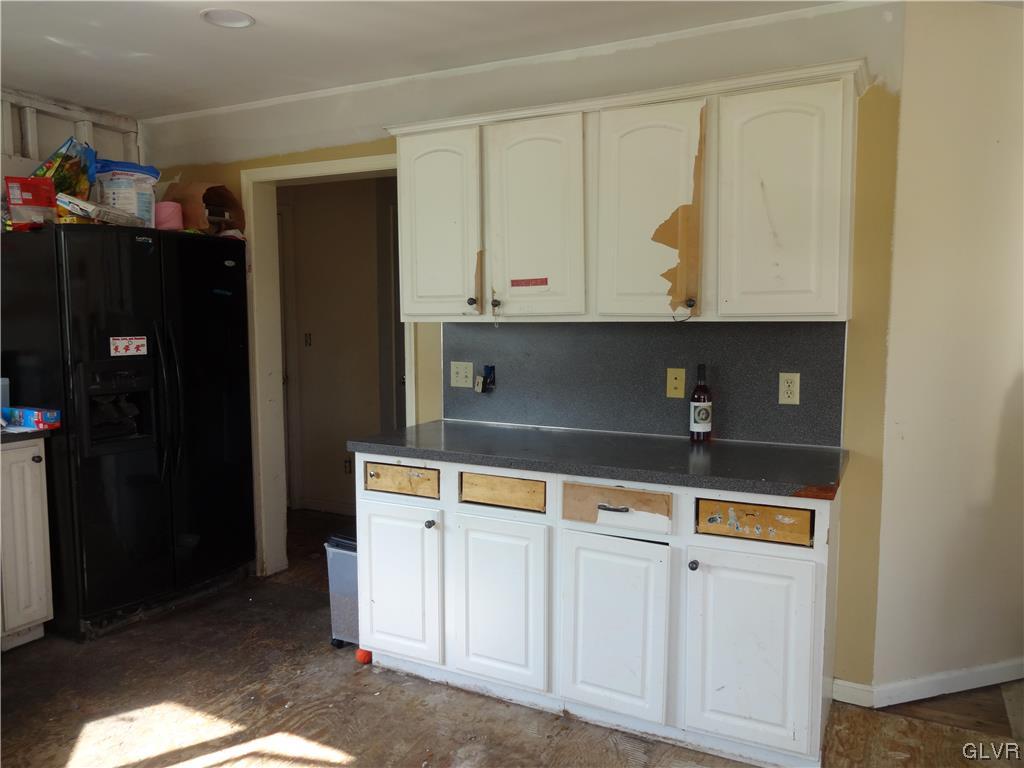 2311 Yost Road Bath, PA 18014 - Photo 13 of 21 a kitchen with white cabinets and refrigerator