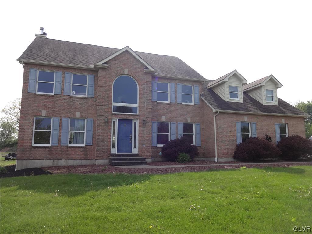 2311 Yost Road Bath, PA 18014 - Photo 2 of 21 a front view of a house with a yard