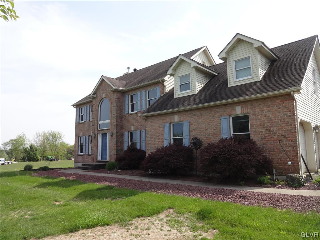 2311 Yost Road Bath, PA 18014 - Photo 3 of 21 a front view of a house with garden