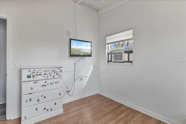 a view of a livingroom with wooden floor