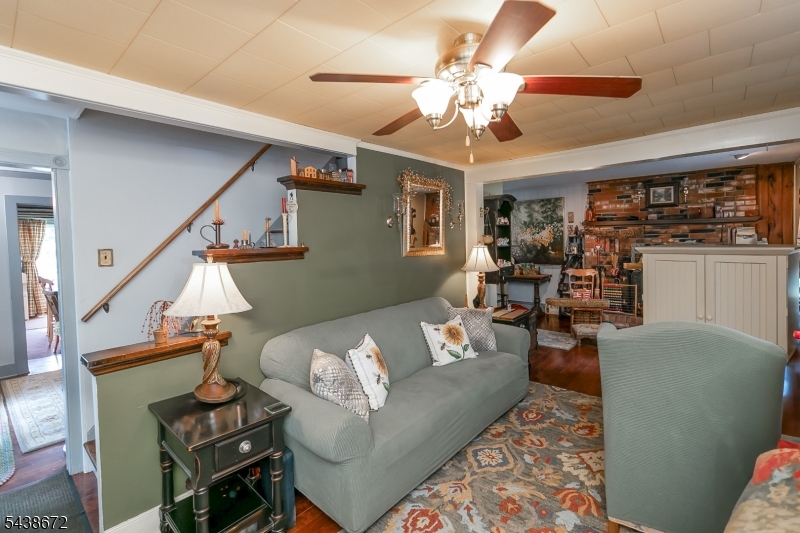 36 Main Street Flanders, NJ 07836 - Photo 13 of 31 a living room with furniture and a chandelier